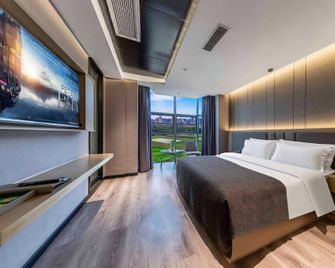 Yibin Yuntian Hotel (Xuzhou Cuibai Commercial City Branch) - Їбін - Спальня