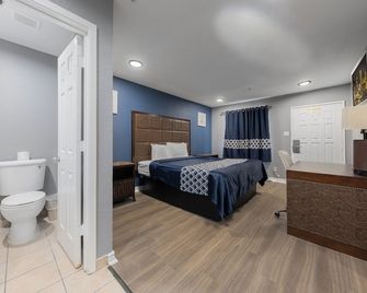 Golden Inn Dallas by Hotel O - Balch Springs - Bedroom