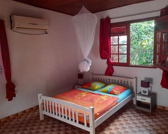 plage et vacance - Sainte-Anne - Bedroom