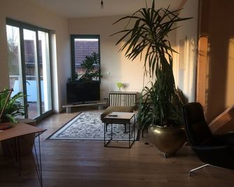 Landlust am See - View by the fireplace - Zossen - Living room