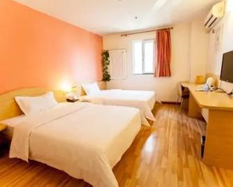 7 Days Inn Zibo Linzi Tianqi Road Qinayingcheng Branch - Zibo - Schlafzimmer