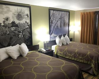 Super 8 by Wyndham Topeka/Wanamaker RD/I-70 - טופקה - חדר שינה