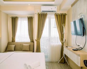 Comfortable Studio Apartment At Urban Heights Residences Bsd City By Travelio - Kota Tangerang - Kamar Tidur
