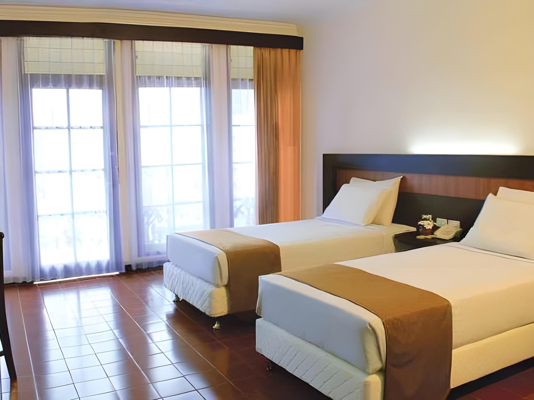 Danau Toba International Cottage Berastagi - Berastagi - Schlafzimmer