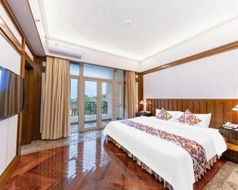 Lilac Garden Hotel - Qingyuan - Ložnice