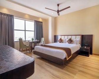 Monday Hotels Amalapuram Heights - Amalāpuram - Bedroom