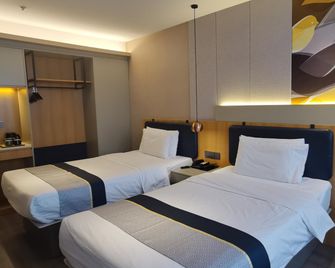 Motel Taiyuan Jianshe Road Railway Station Wuyi Square - Tchaj-jüan - Ložnice