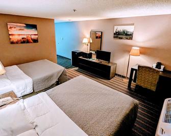 Woodfield Inn and Suites - Marshfield - Schlafzimmer