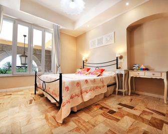 Onda Marina Rooms - קליארי - חדר שינה