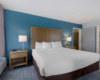 Comfort Inn and Suites Alexandria West - אלכסנדריה - חדר שינה