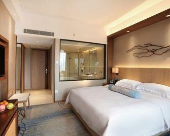 Great International Hotel - Heyuan - Schlafzimmer