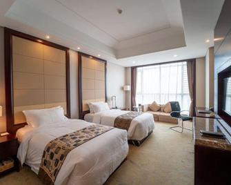 Sunwu Hot Spring International Hotel - Binzhou - Bedroom