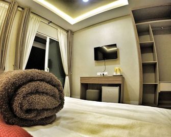 Destini Akef Villa - Pantai Cenang - Schlafzimmer
