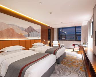 Ramada Encore by Wyndham Jingzhou Shashi - Jingzhou - Bedroom