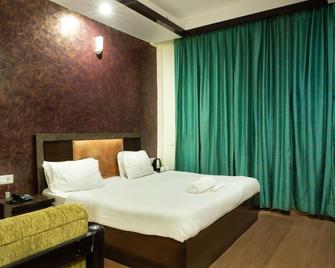 Rhodo Inn - Dhanaulti - Bedroom
