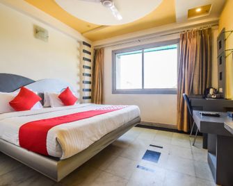 Capital O 3225 Grande Sita - Udaipur - Bedroom