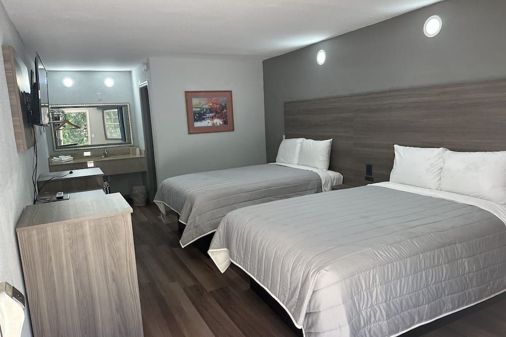 Budget Inn Express- Columbia - קולומביה - חדר שינה