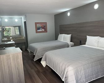 Budget Inn Express- Columbia - קולומביה - חדר שינה