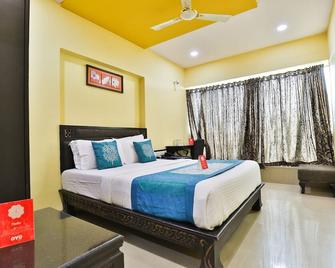 Hotel O Lotus Residency - Daman - Ložnice