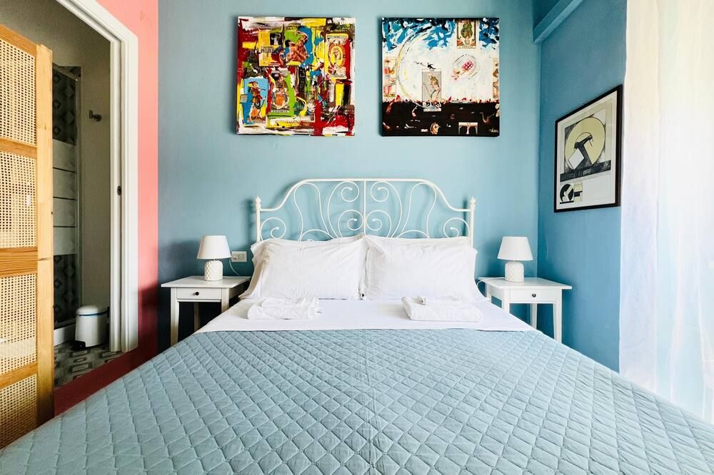 أبارتمنت سونينو 37 - كاغلياري - غرفة نوم