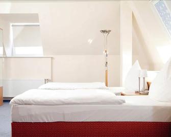 City Hotel - Delmenhorst - Schlafzimmer