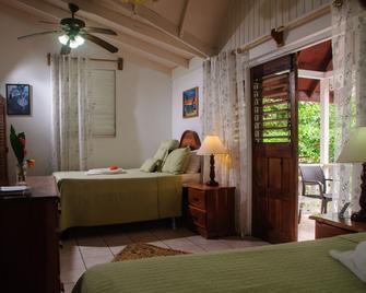 Firefly Beach Cottages - Negril - Bedroom