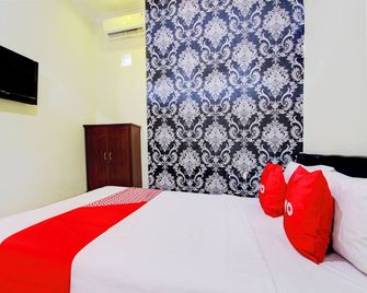 Hotel O Sleman Bandara Adi Sutjipto - 6 Hour Stay - Daerah Istimewa Yogyakarta - Kamar Tidur