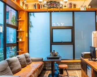Tianmenshan Loft Art Inn - Zhangjiajie - Huiskamer