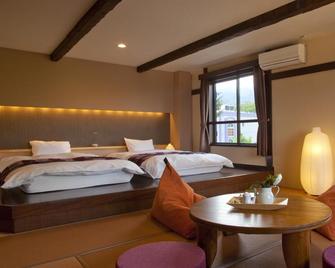 Hotel Hakuba Berghaus - Otari - Schlafzimmer