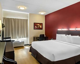 ريد روف إن بلس + جاكسونفيل - ساوث بوينت - جاكسونفيل (فلوريدا) - غرفة نوم