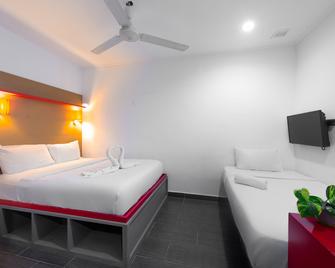 Tune Hotel - Waterfront Kuching - Kuching - Habitación
