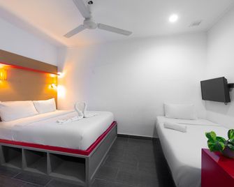 Tune Hotel - Waterfront Kuching - קוצ'ינג - חדר שינה