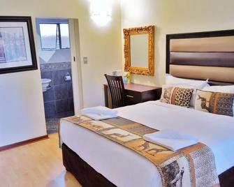 Ecotel Premier Lodge & Conference Centre - Benoni - Habitación