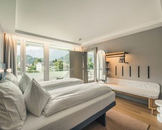 هوب أبارتمنتس آند سويتس - إنترلاكين - غرفة نوم