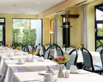 Days Inn by Wyndham Leipzig Messe - Leipzig - Restaurant