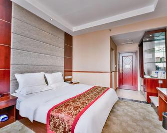 Yuanxuan Hotel (Anshun Xintiandi Food Street) - Anshun - Bedroom
