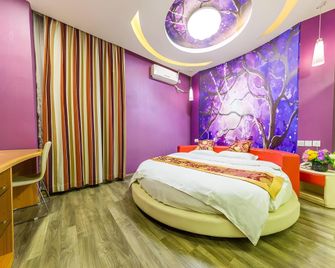 땡크 인 호텔 산둥 칭다오 레일웨이 노스 스테이션 준펑 로드 - 칭다오 - 침실