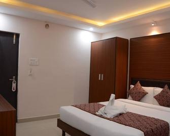 Kamat Inn - Patna - Ložnice