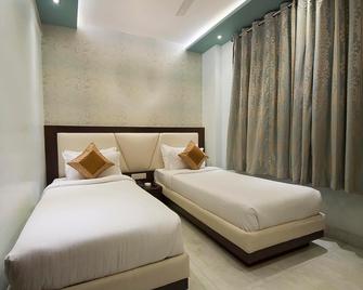 هوتل سنترال ريزيدنسي - فاراناسي - غرفة نوم