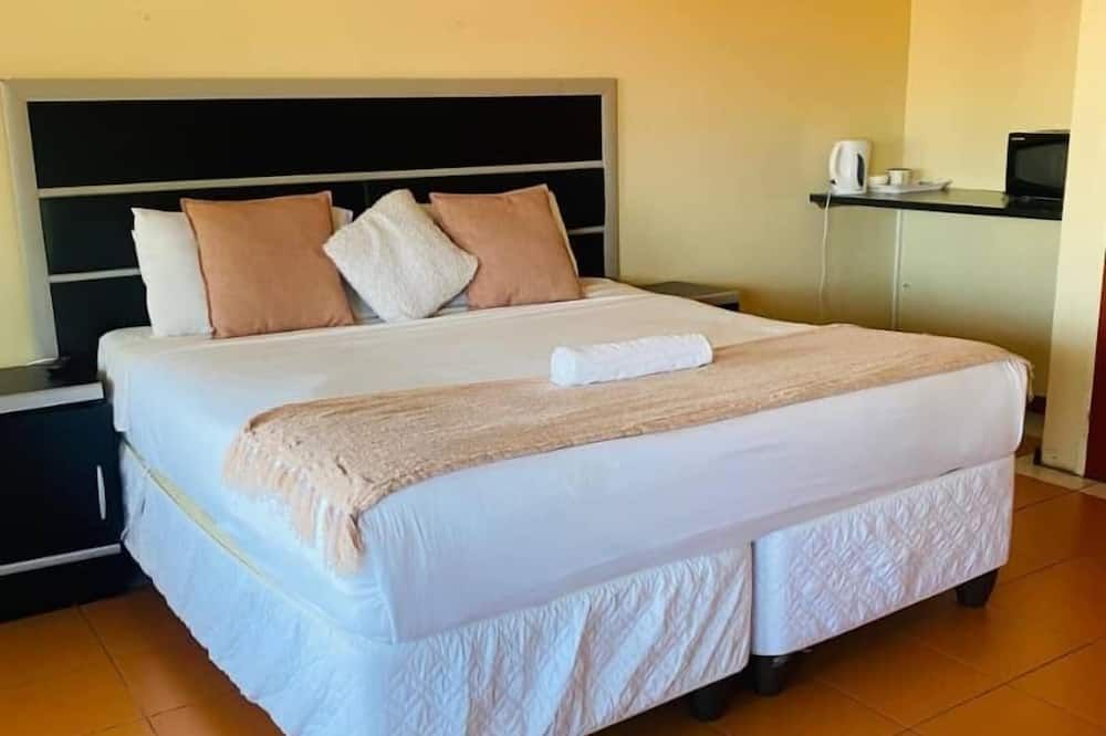 ذا هافن جيست هاوس تيمبيليل - مبابان - غرفة نوم