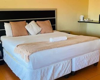 ذا هافن جيست هاوس تيمبيليل - مبابان - غرفة نوم