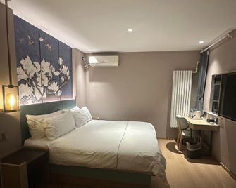 Jinjiang Inn Baoding Junxiao Square Branch - Baoding - Bedroom