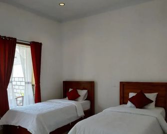 Omah Nusa Villa Redpartner - נוסה פנידה - חדר שינה