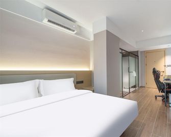 Pisces Reserve Hotel (Nanjing Olympic Sports Center Branch) - Nankín - Habitación