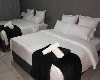 Tsamatiku Guesthouse - Hazyview - Schlafzimmer