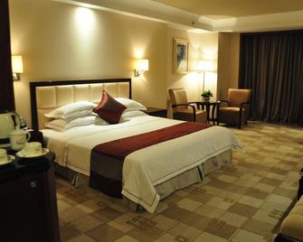 Country Garden Phoenix Hotel Huangshan - הואנגשאן - חדר שינה