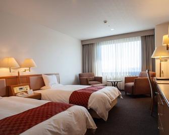 Utsunomiya Higashi Hotel - Utsunomiya - Спальня