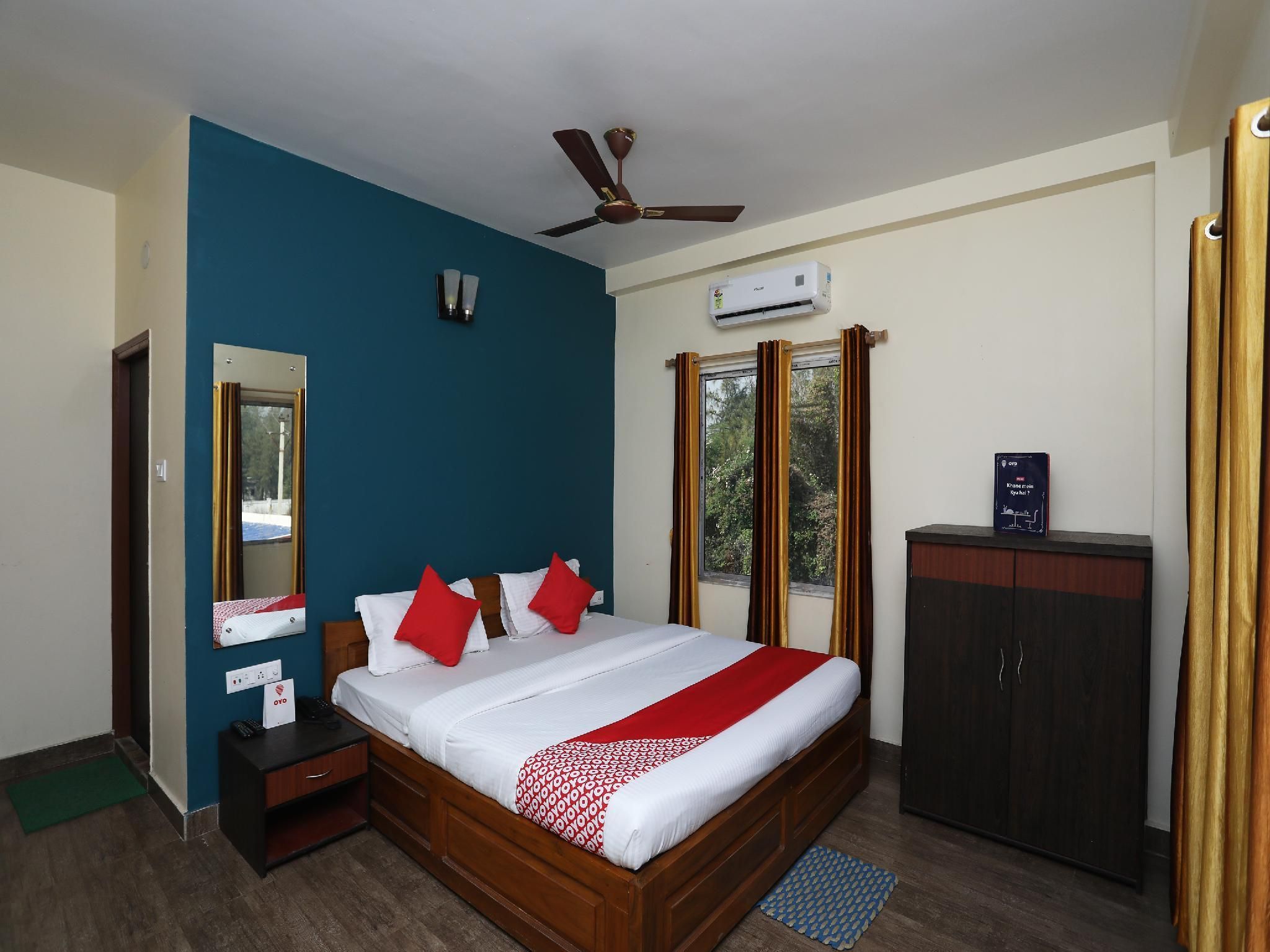 OYO 22622 Dolphin Beach Resort - Mandarmani - Спальня