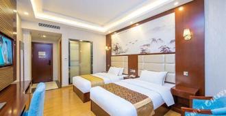 Wansheng Business Hotel - Changsha - Bedroom