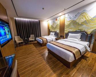 Jinlong Hotel - Chaozhou - Bedroom